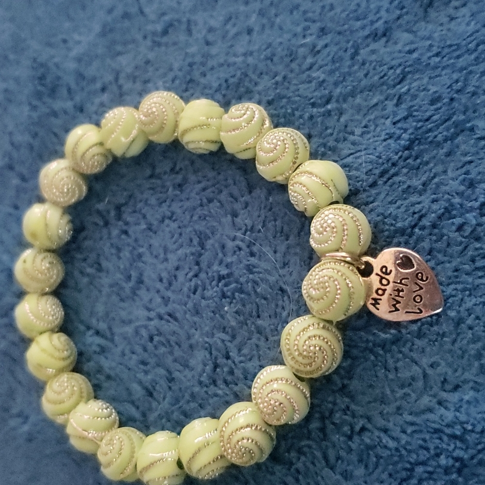 Lime beads approximately 7 1/4 inches silver accented  beads.